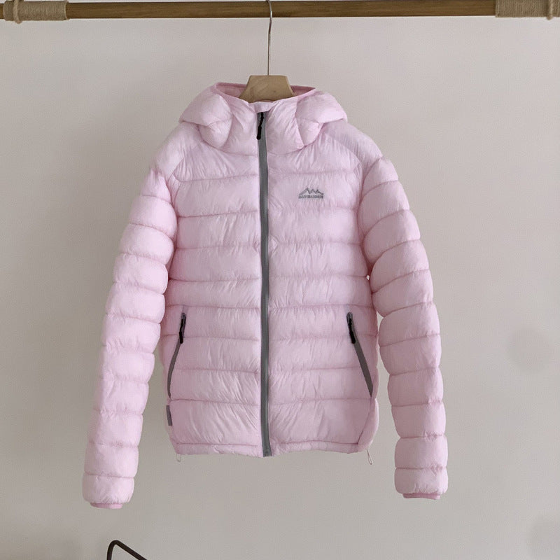 Damen ultraleichte Pufferjacke mit abnehmbarer Kapuze und elastischem Saum ModeGeist