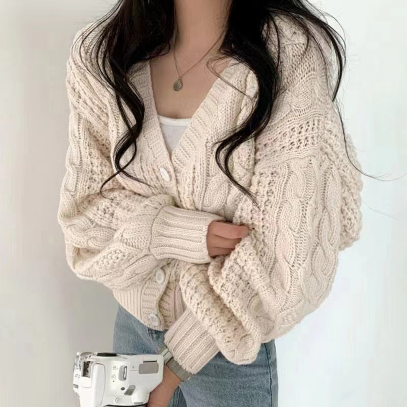 Damen Grobstrickjacke mit voluminösen Ärmeln und einzigartigem Zopfmuster ModeGeist