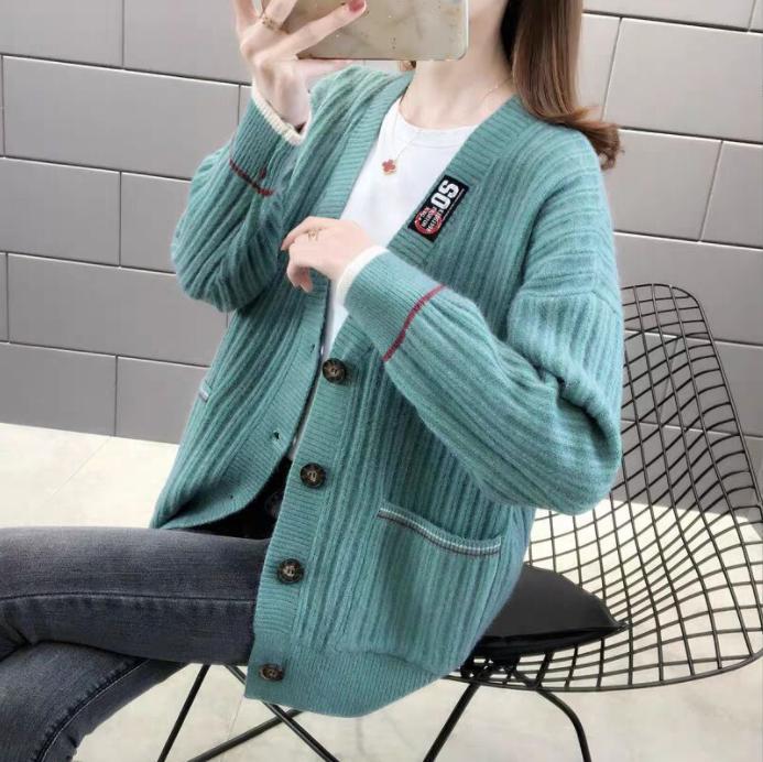 Damen Strickjacke mit strukturiertem Rippmuster und praktischen Taschen ModeGeist