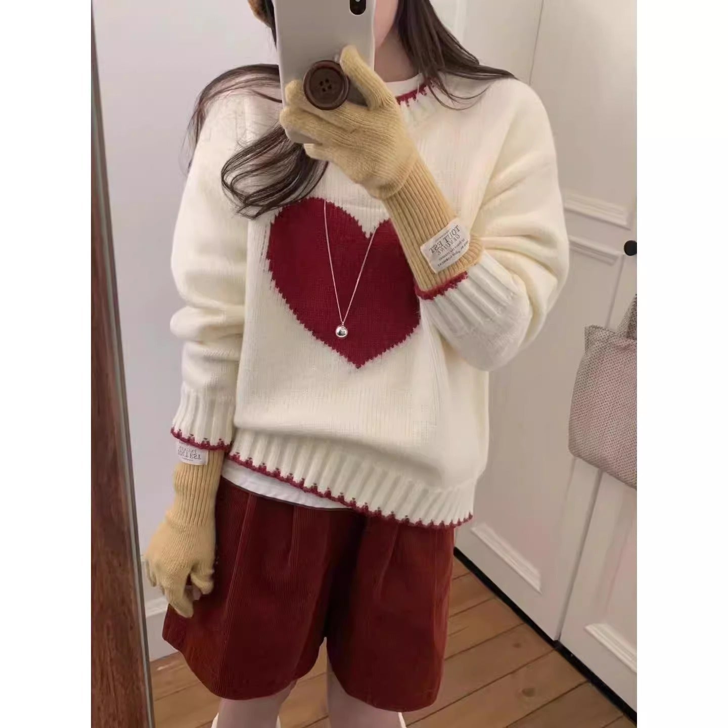 Damen angesagter Pullover mit Herzmotiv und lässigem Schnitt ModeGeist