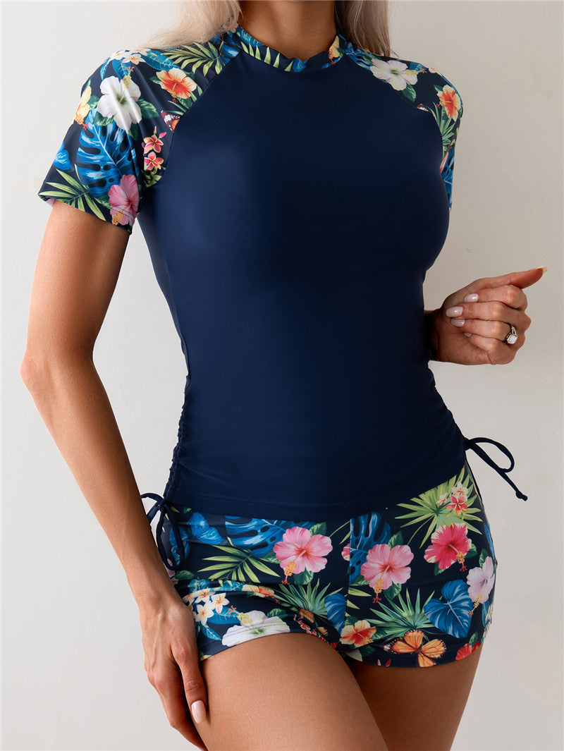 Sportliches Damen Rashguard-Set mit Blumenmuster und elastischer Hose von MODEGEIST