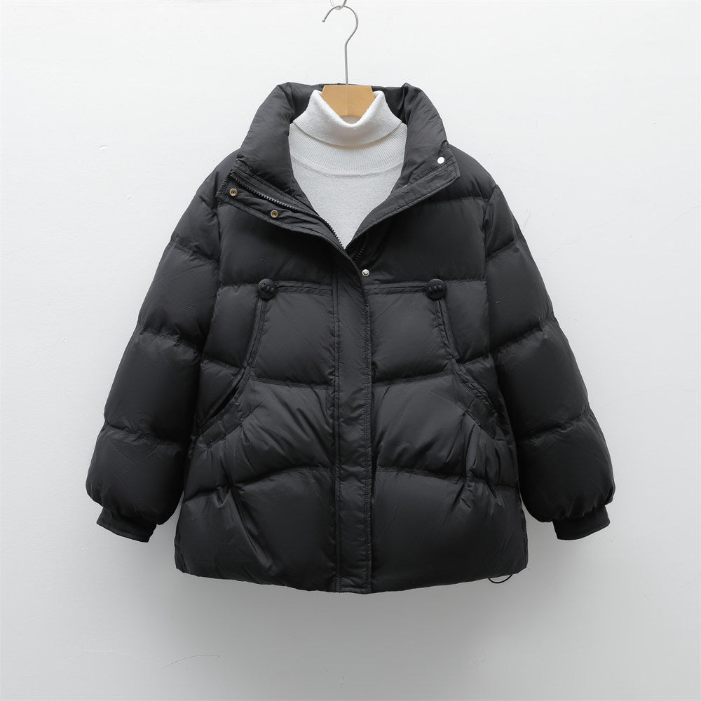 Damen voluminöse Winterjacke mit praktischen Taschen und hochschließendem Kragen ModeGeist