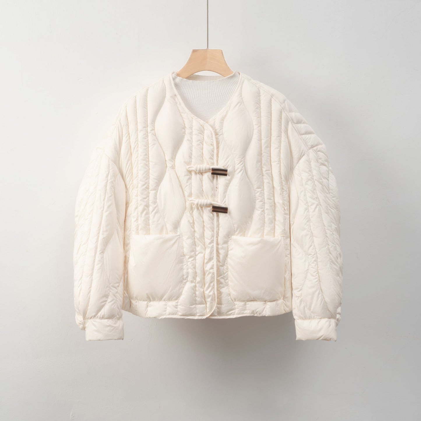 Damen Steppjacke mit praktischem Knopfverschluss und gemütlichen Taschen ModeGeist