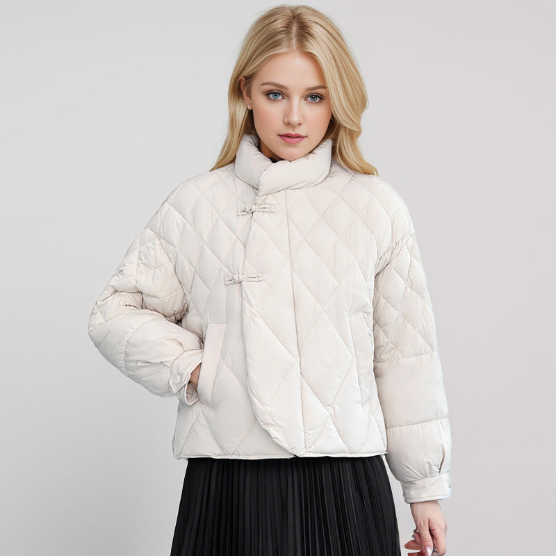 Damen gesteppte Jacke mit hohem Kragen und praktischen Druckknopfdetails ModeGeist
