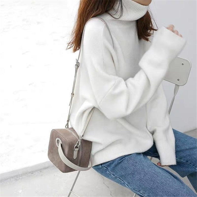 Damen Oversized Pullover mit hohem Kragen und Puffärmeln ModeGeist