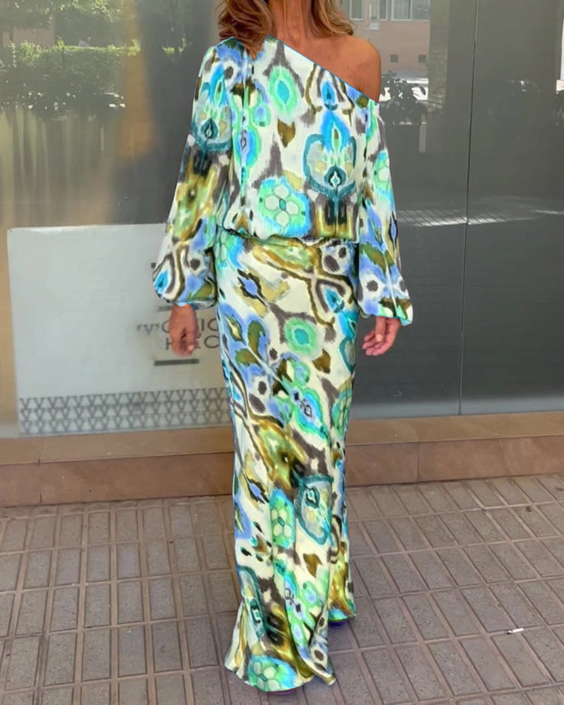 Damen Elegantes Maxikleid im grafischen Batikdesign mit Off-Shoulder-Ausschnitt und voluminösen Ärmeln ModeGeist