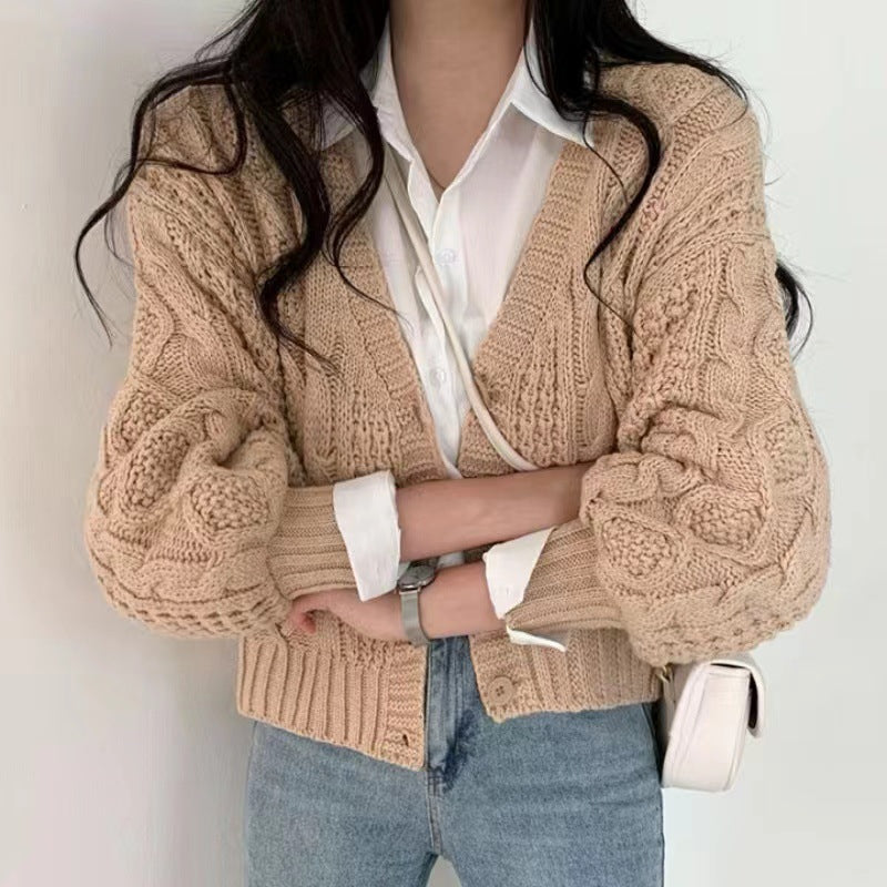 Damen Grobstrickjacke mit voluminösen Ärmeln und einzigartigem Zopfmuster ModeGeist