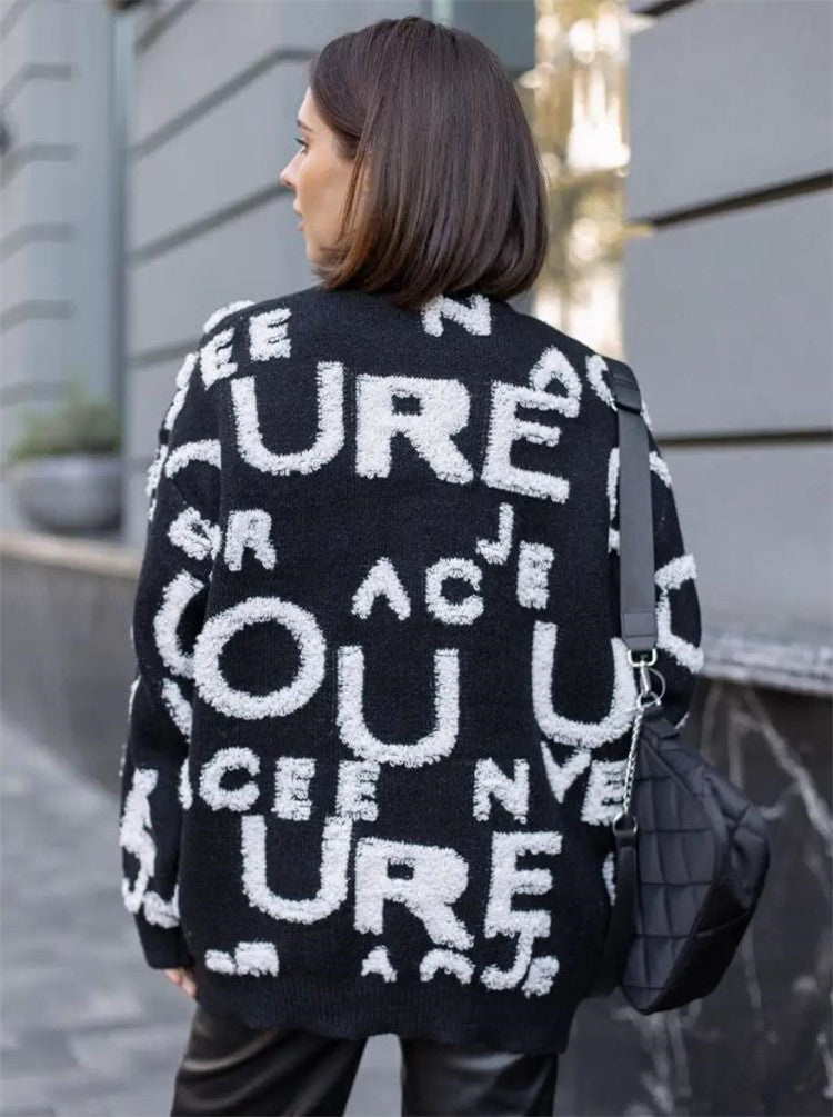 Damen Oversized Strickpullover mit auffälligem Schriftzug und lässiger Passform ModeGeist