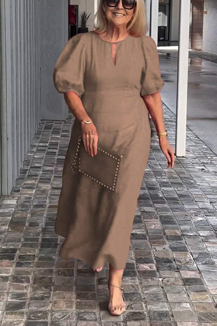Elegantes Maxikleid für Damen mit Puffärmeln und dekorativem Saum von MODEGEIST