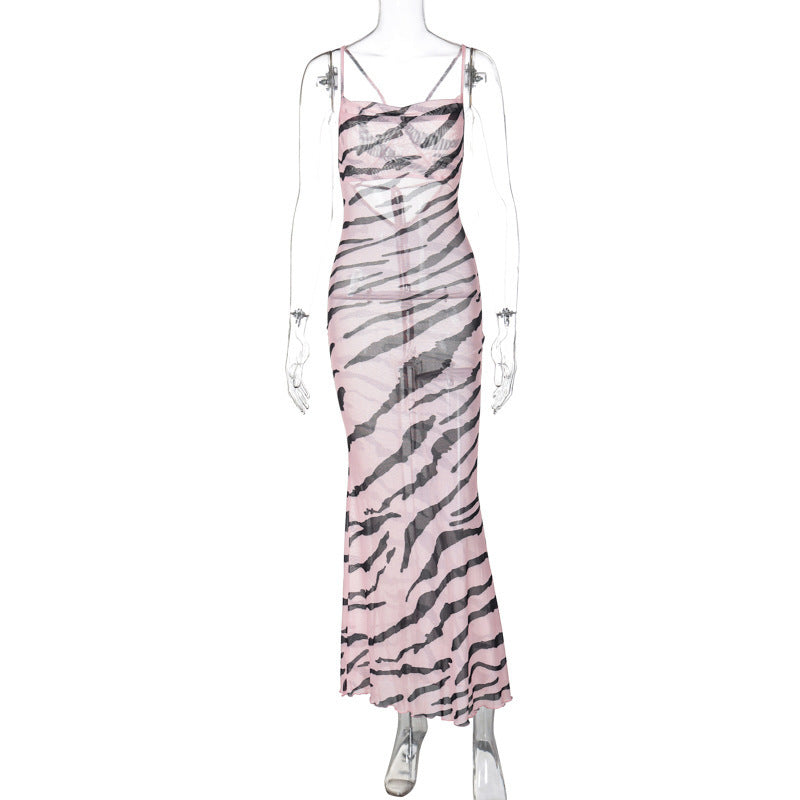 Elegantes Maxikleid mit Zebraprint und Spaghettiträgern von MODEGEIST