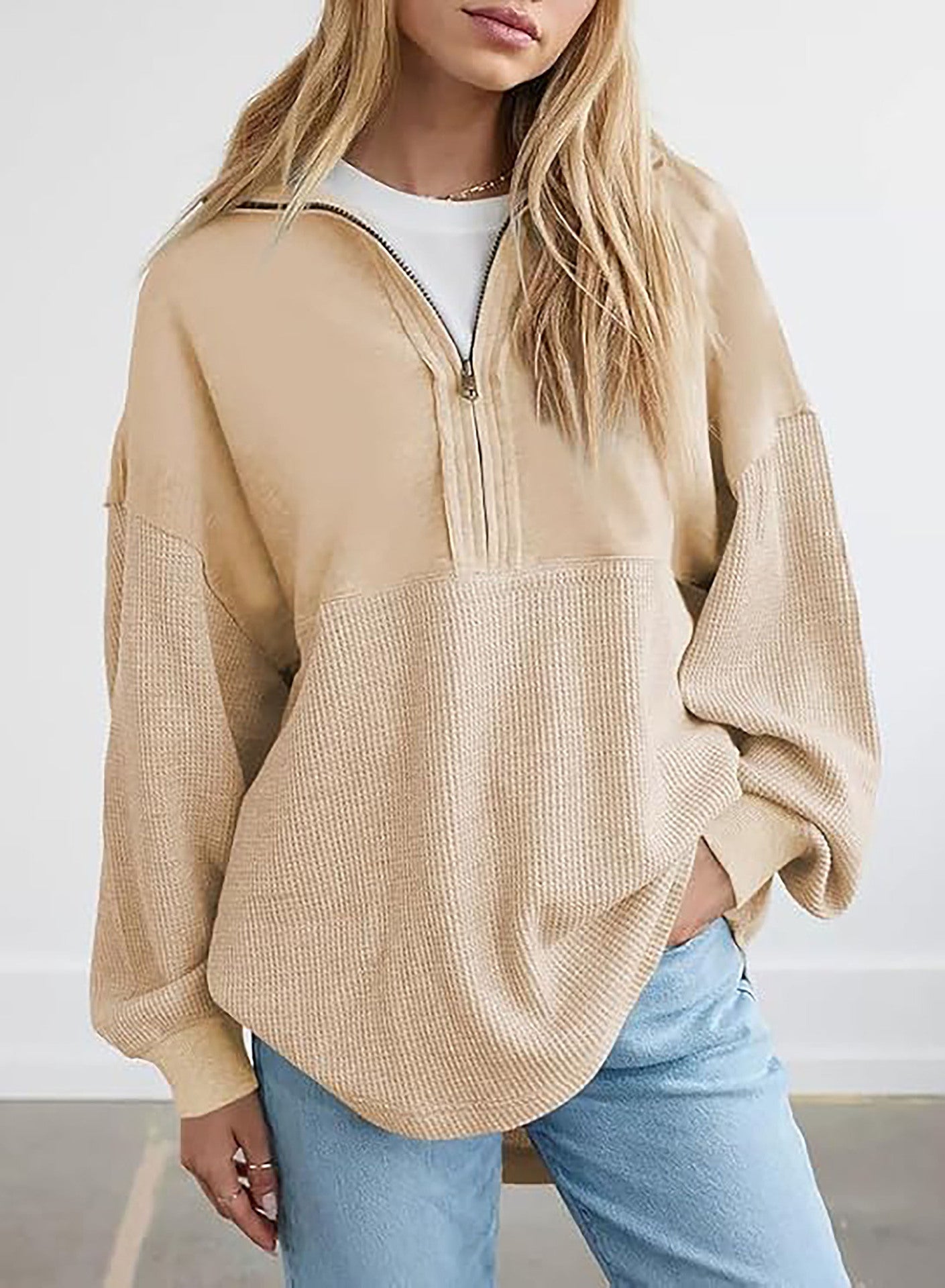 Damen lässiger Kapuzenpullover mit halblangem Reißverschluss und strukturiertem Material ModeGeist