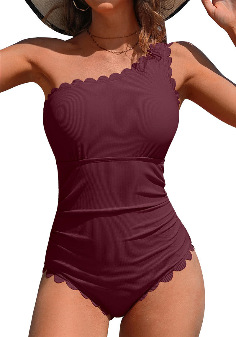 Elegantes, figurformendes Damen-Badekleid mit Wellenbesatz von MODEGEIST