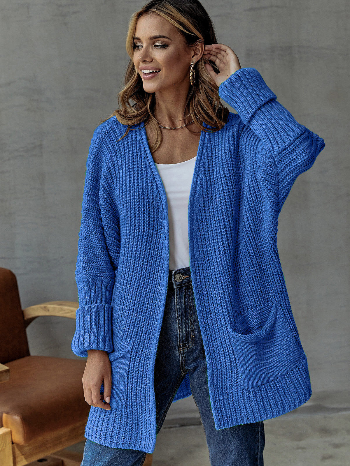 Damen gestrickter Cardigan mit großzügigen Taschen und strukturiertem Design ModeGeist