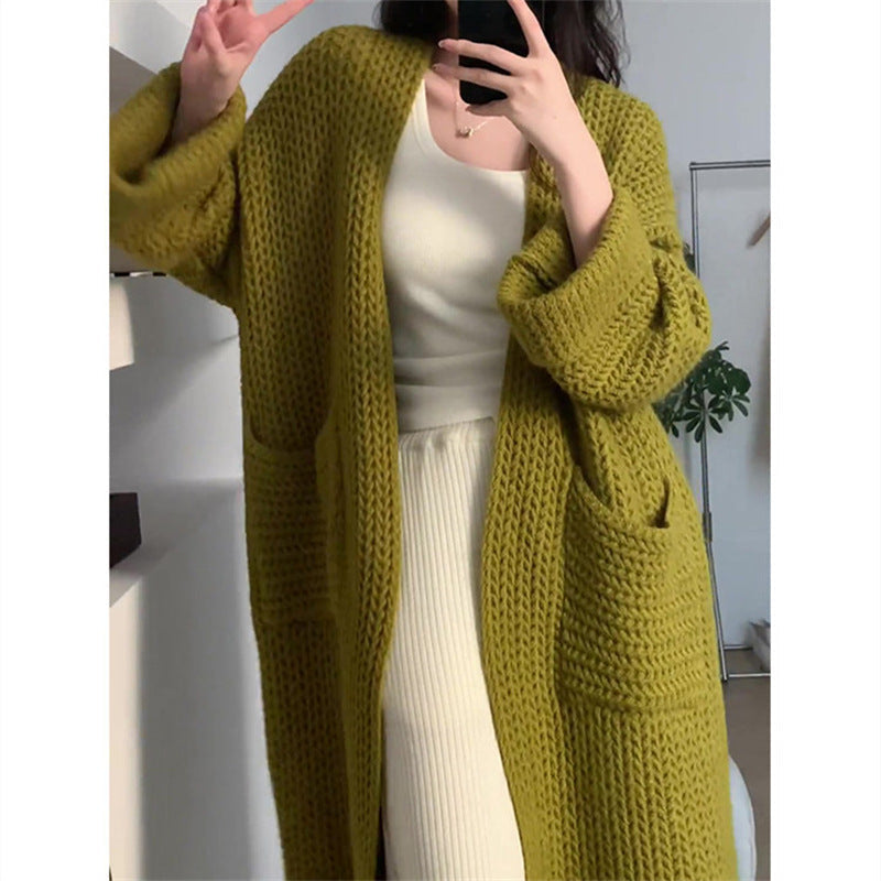 Damen Lange Strickjacke mit praktischen Taschen und modischem Zopfmuster ModeGeist