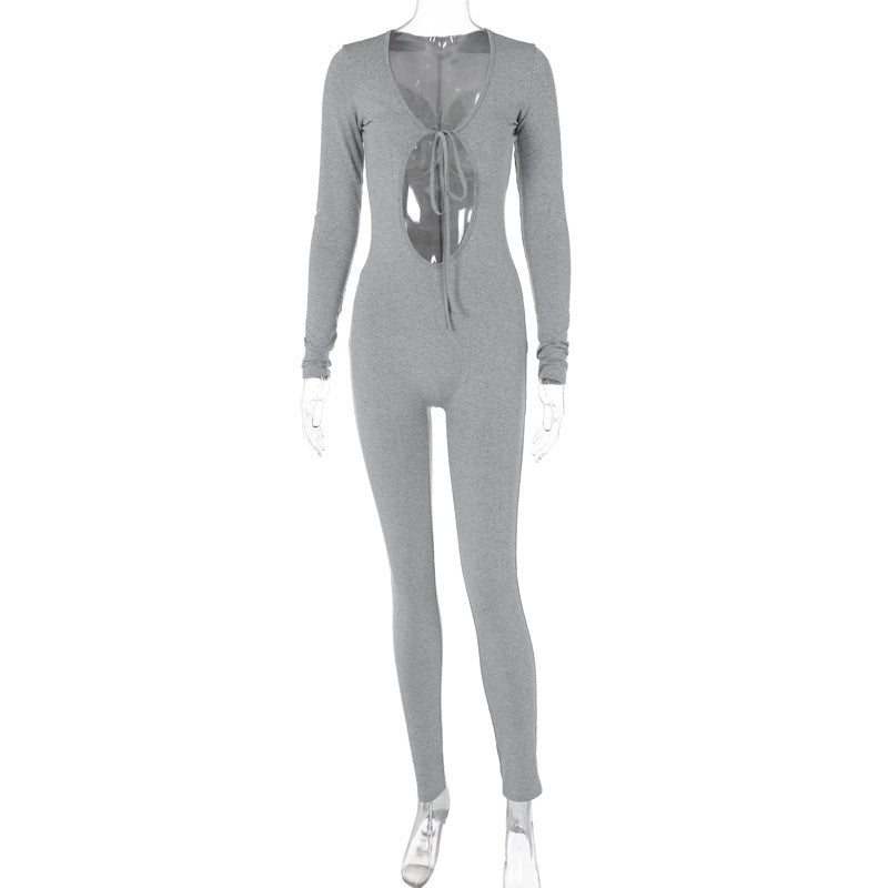 Modern, form-fitting jumpsuit with innovative cut-out design and long sleeves