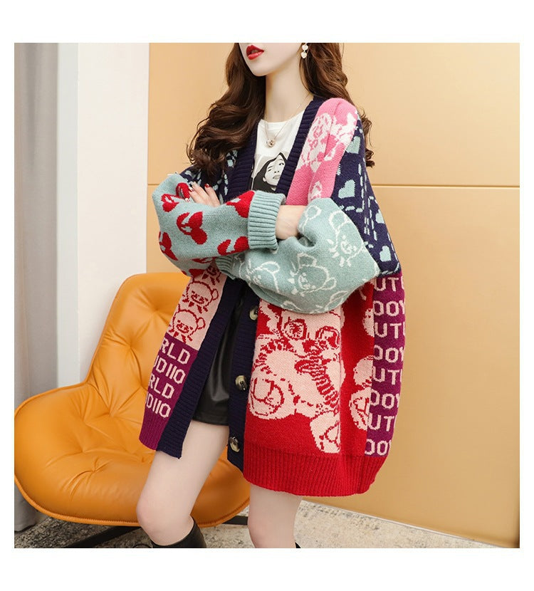 Damen Strickjacke mit lebhaftem Motiv und praktischen Knopfdetails ModeGeist