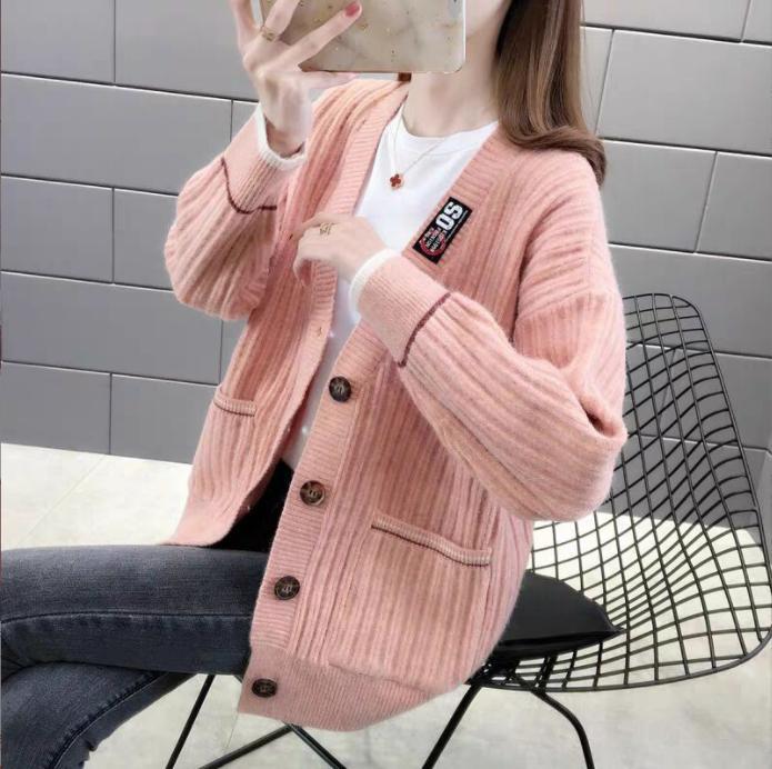 Damen Strickjacke mit strukturiertem Rippmuster und praktischen Taschen ModeGeist