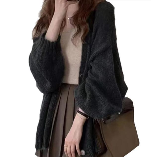 Damen Modische Strickjacke mit weiten Ärmeln und eleganten Details ModeGeist