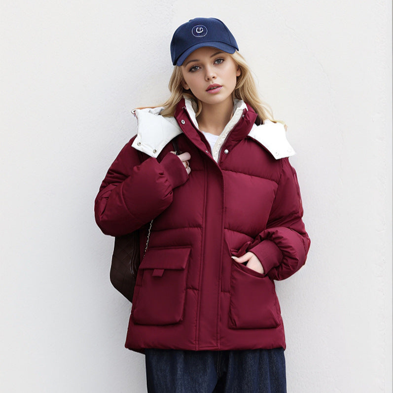 Damen gefütterte Pufferjacke mit großzügigen Taschen und abnehmbarer Kapuze ModeGeist