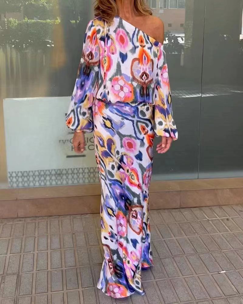 Damen Elegantes Maxikleid im grafischen Batikdesign mit Off-Shoulder-Ausschnitt und voluminösen Ärmeln ModeGeist