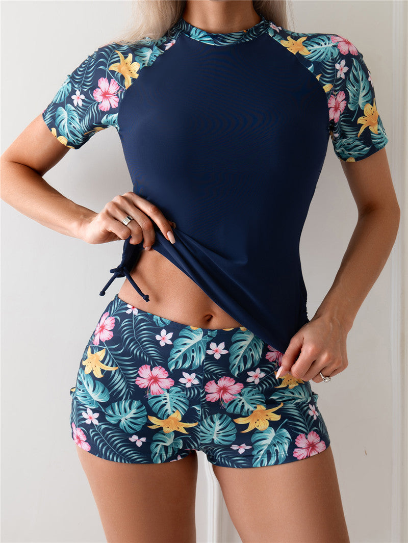 Sportliches Damen Rashguard-Set mit Blumenmuster und elastischer Hose von MODEGEIST