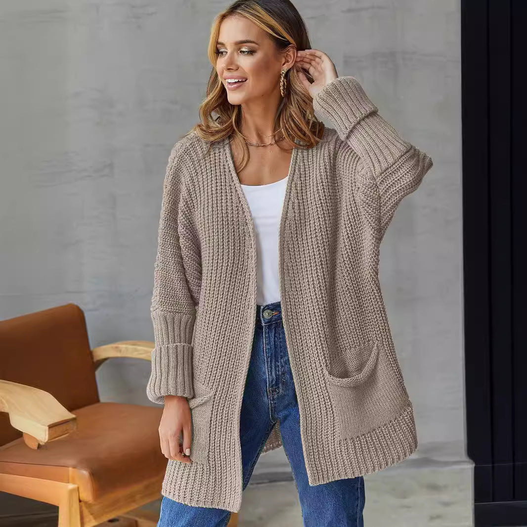 Damen gestrickter Cardigan mit großzügigen Taschen und strukturiertem Design ModeGeist
