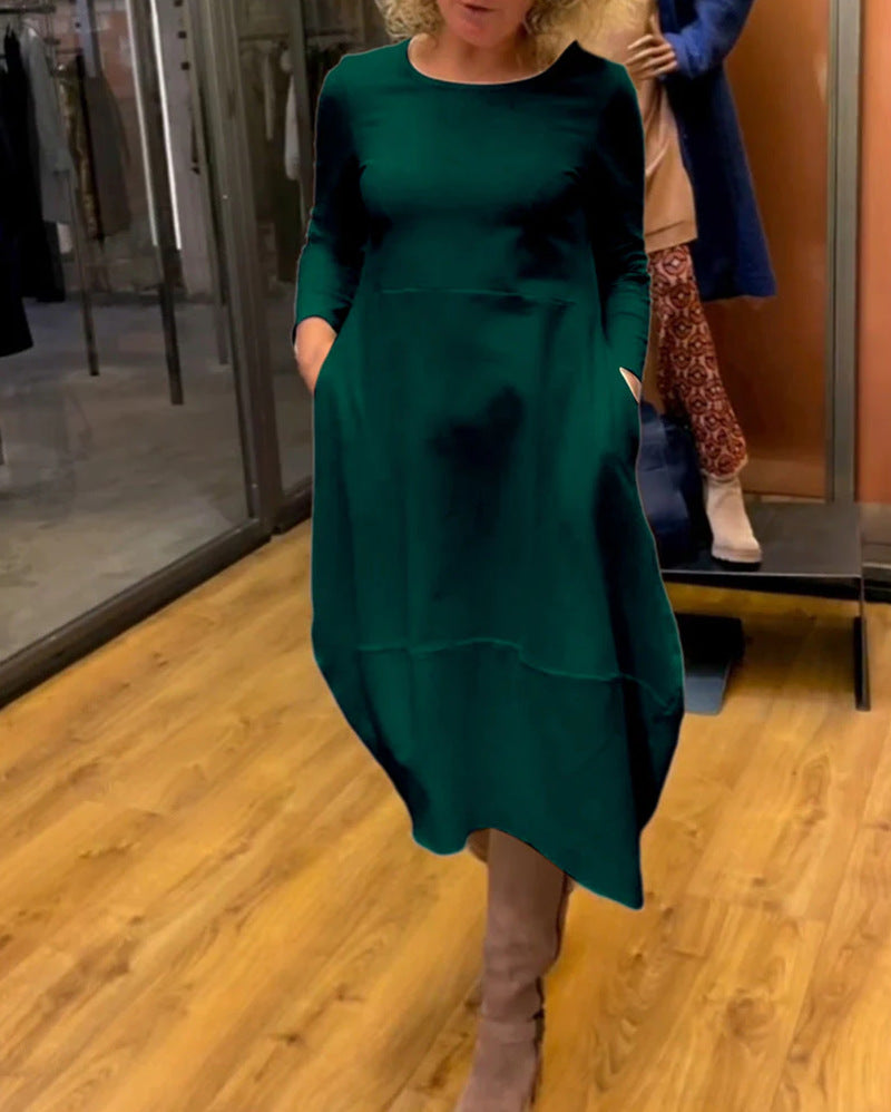Elegantes, asymmetrisches Damenkleid mit Taschen von MODEGEIST