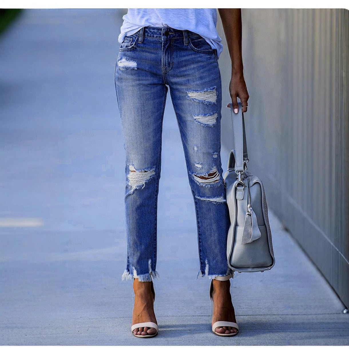 Damen Ripped Jeans im modernen Vintage-Look mit fransigen Säumen ModeGeist
