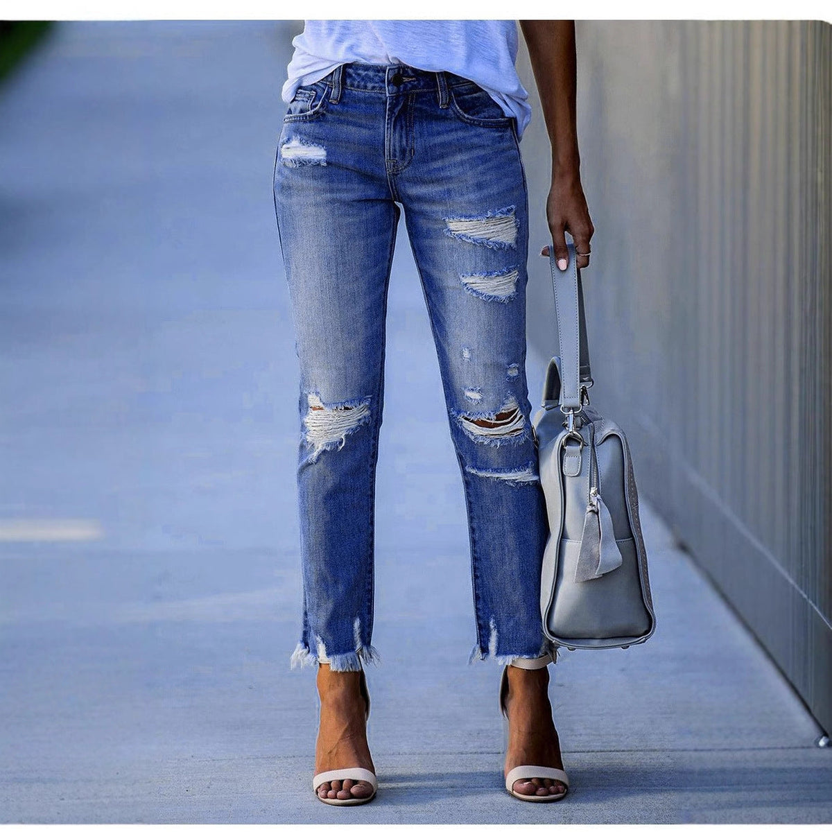 Damen Ripped Jeans im modernen Vintage-Look mit fransigen Säumen ModeGeist