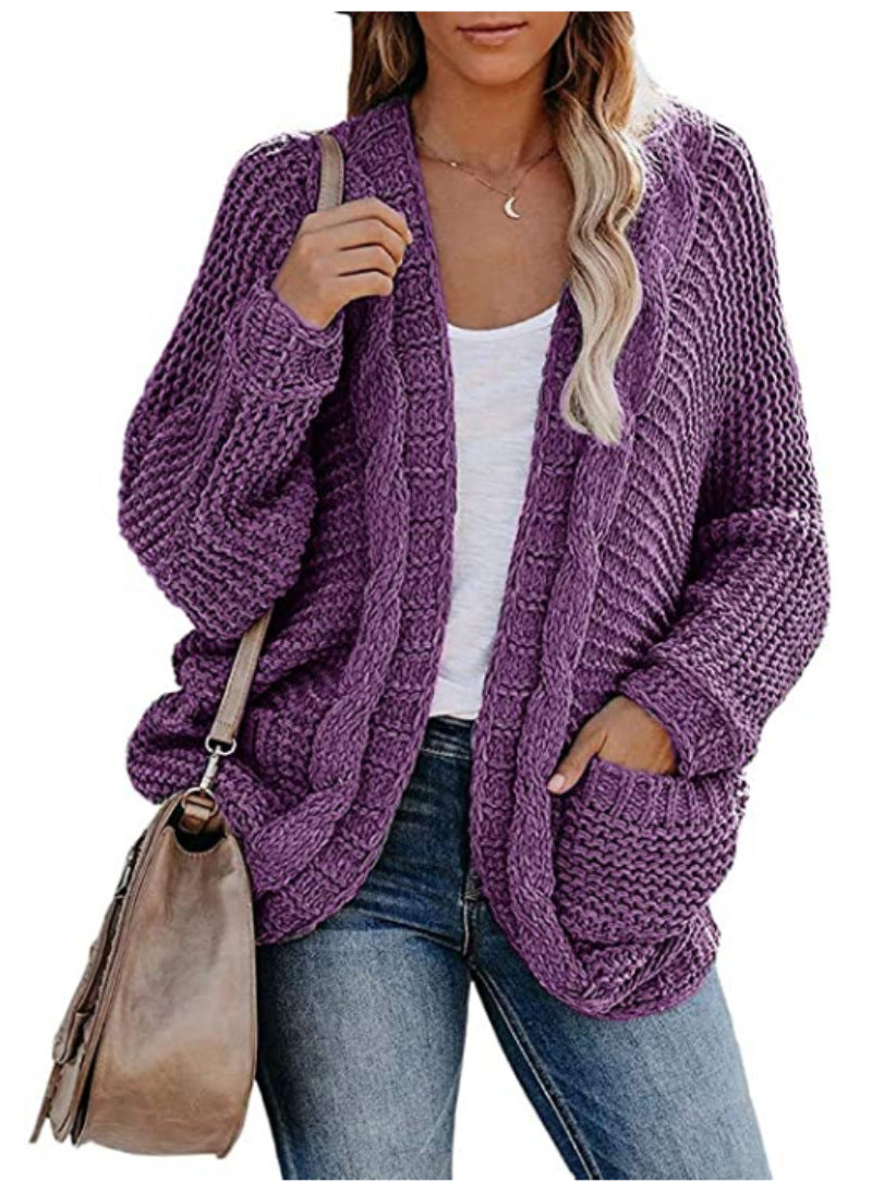 Damen Grobstrickjacke mit lässigen Konturen und großen Taschen ModeGeist