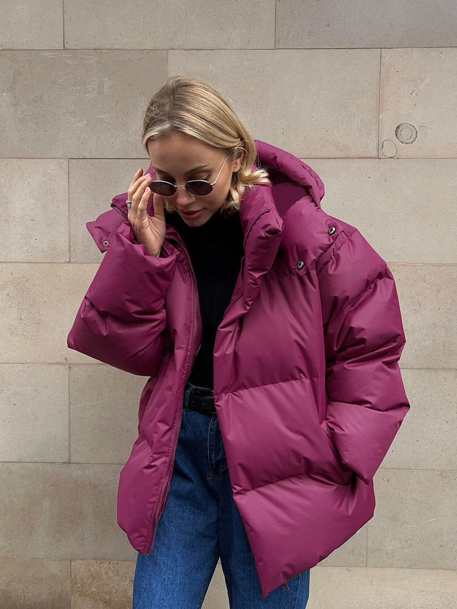 Damen sportliche Daunenjacke mit hohem Kragen und voluminösem Schnitt ModeGeist