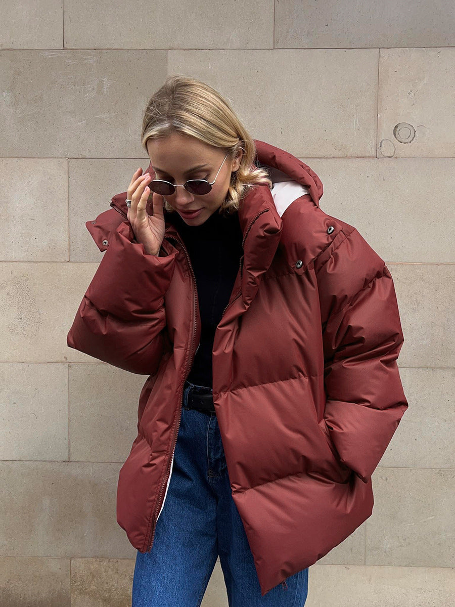 Damen sportliche Daunenjacke mit hohem Kragen und voluminösem Schnitt ModeGeist