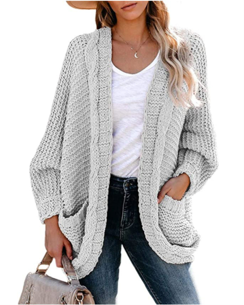 Damen Grobstrickjacke mit lässigen Konturen und großen Taschen ModeGeist