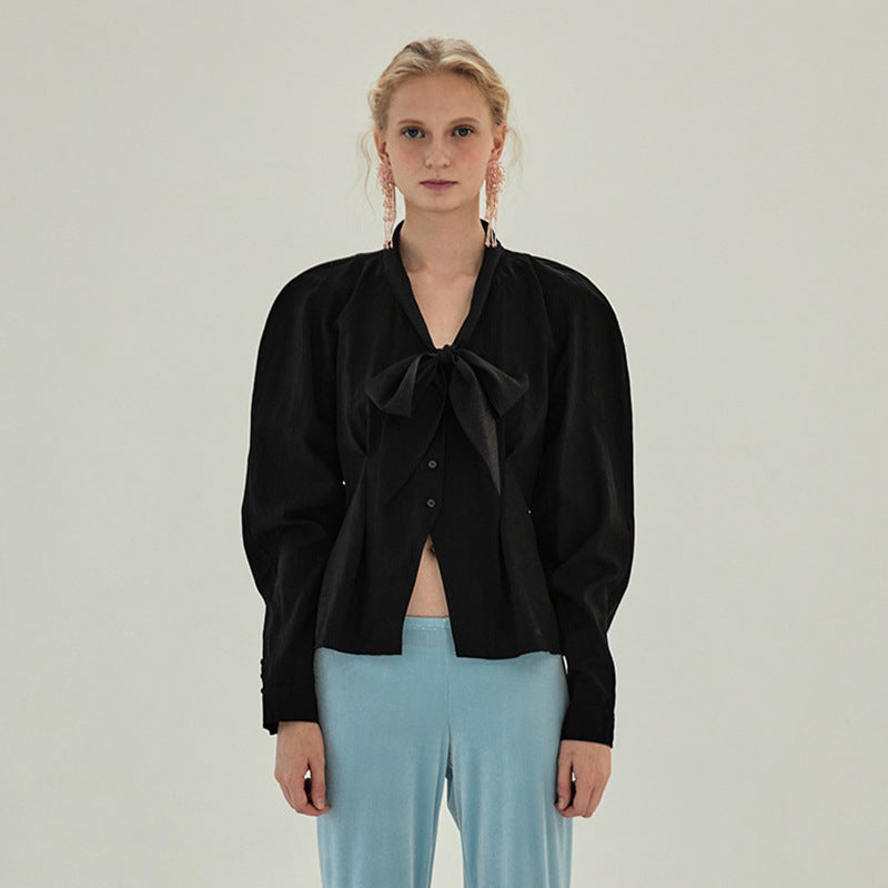 Modische Bluse für Damen mit eleganten Schleifen und weiten Ärmeln