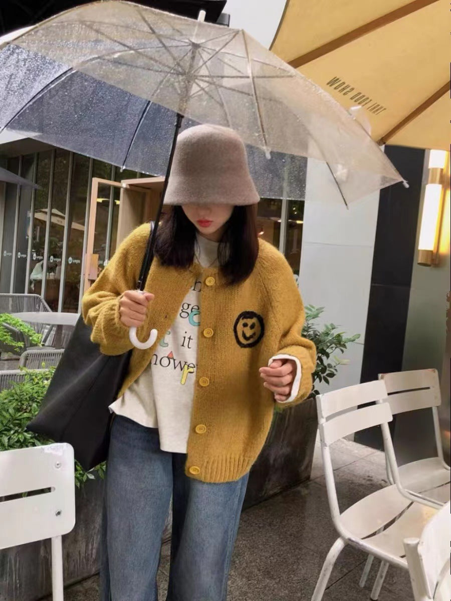 Damen gemütlicher Strickcardigan mit verspieltem Smiley-Motiv ModeGeist