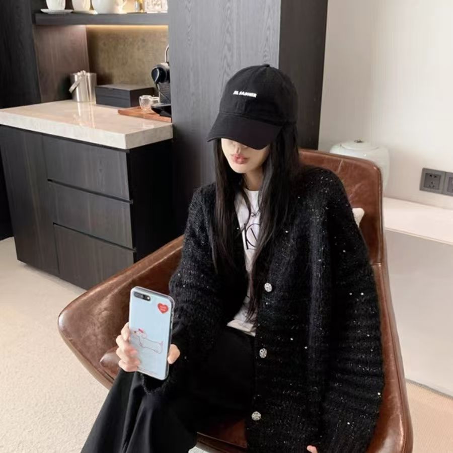 Damen Strickjacke mit voluminösen Ärmeln und einzigartiger Maschenstruktur ModeGeist