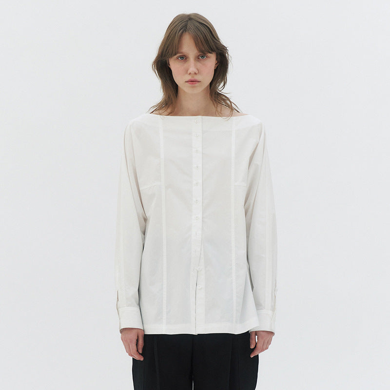 Moderne, elegante Damenbluse aus Baumwolle mit besonderen Knöpfen und entspanntem Schnitt von MODEGEIST