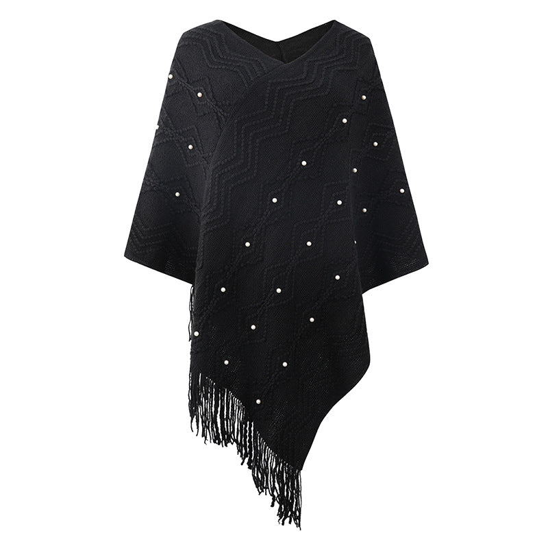 Damen eleganter Poncho mit auffälligem Strukturmuster und dekorativen Fransen ModeGeist