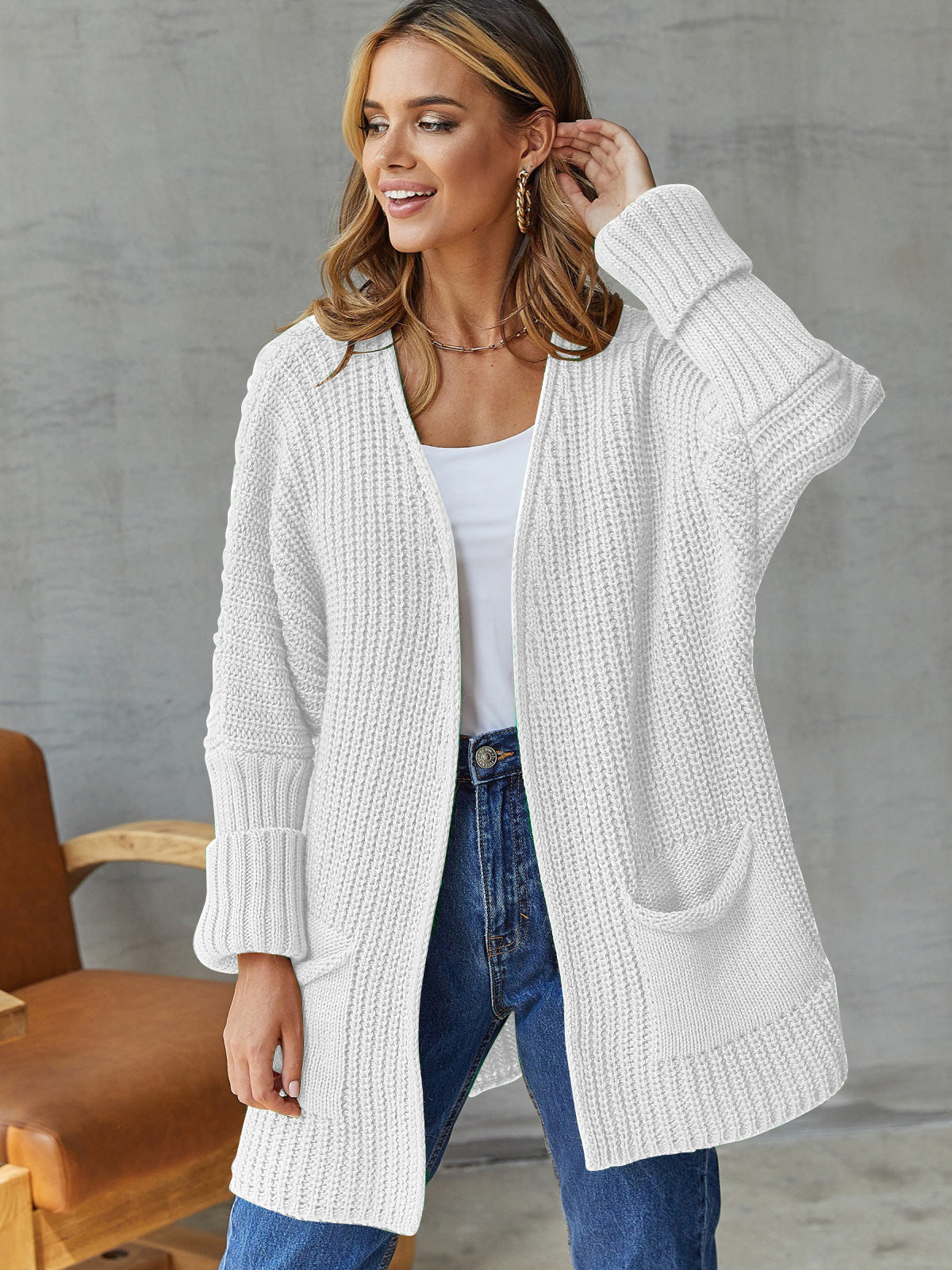 Damen gemütliche Strickjacke mit tiefen Taschen und volumetrischen Ärmeln ModeGeist