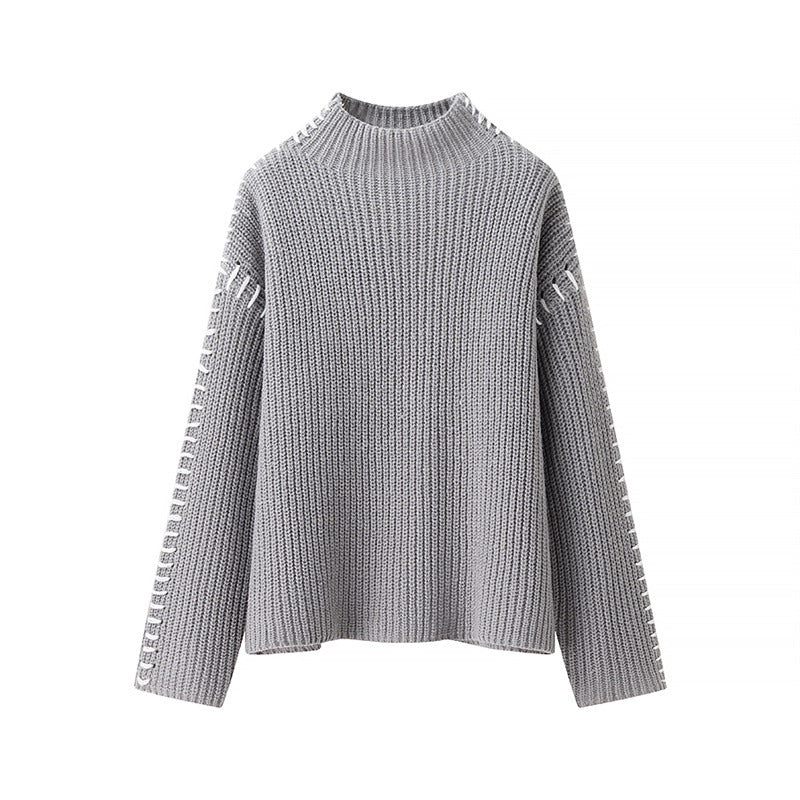 Damen Grobstrickpullover mit hohem Kragen und dekorativen Details ModeGeist