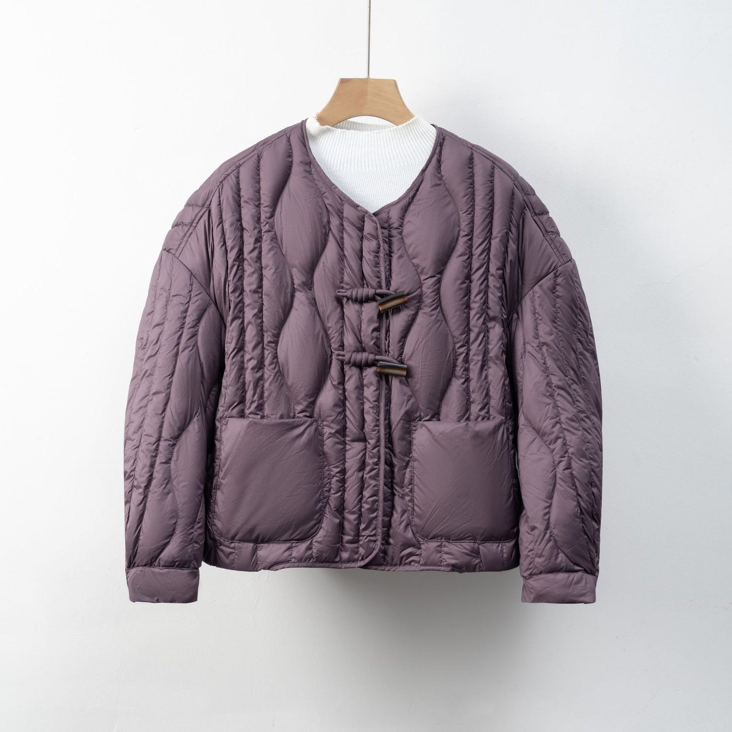 Damen Steppjacke mit praktischem Knopfverschluss und gemütlichen Taschen ModeGeist