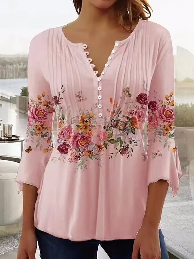 Elegante Damenbluse mit floralem Muster und Knoppelementen von MODEGEIST