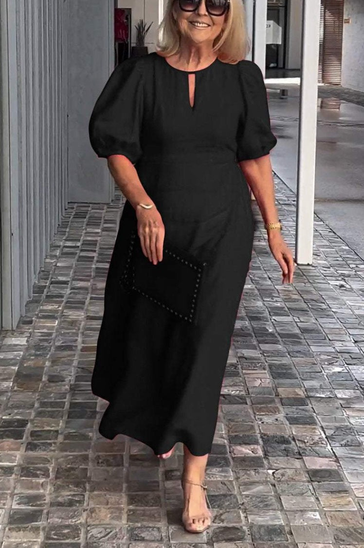 Elegantes Maxikleid für Damen mit Puffärmeln und dekorativem Saum von MODEGEIST