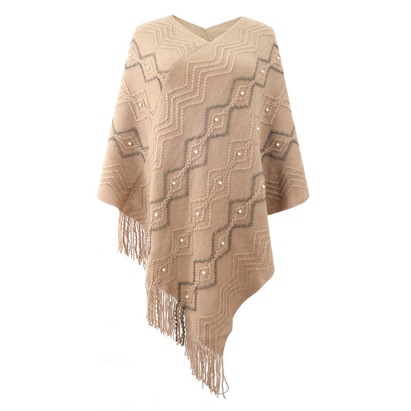 Damen eleganter Poncho mit auffälligem Strukturmuster und dekorativen Fransen ModeGeist