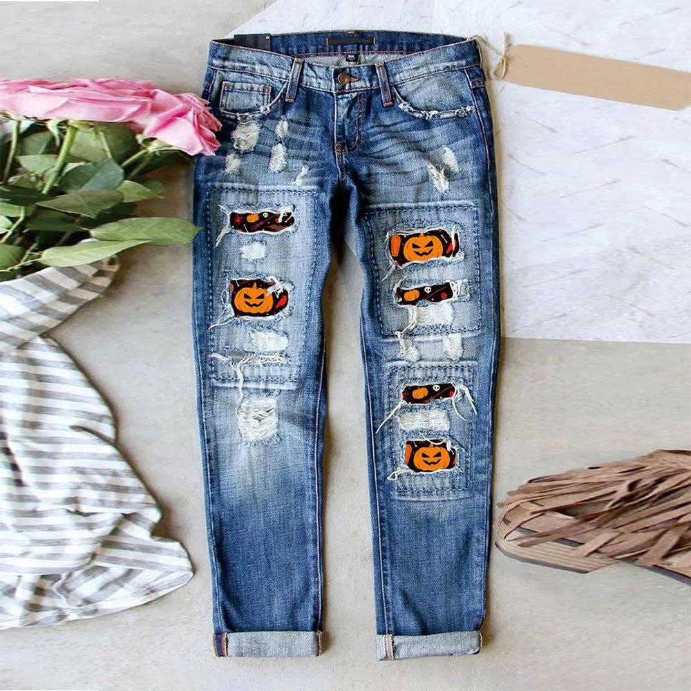 Damen Ripped Jeans mit Halloween-Motiv ModeGeist