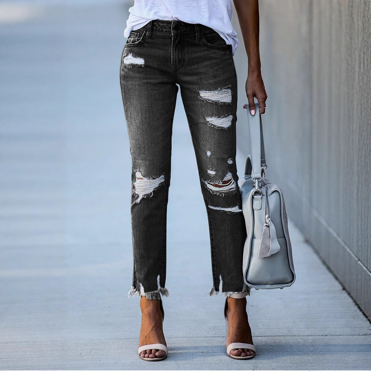 Damen Ripped Jeans im modernen Vintage-Look mit fransigen Säumen ModeGeist