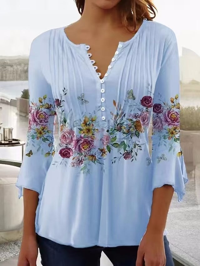 Elegante Damenbluse mit floralem Muster und Knoppelementen von MODEGEIST
