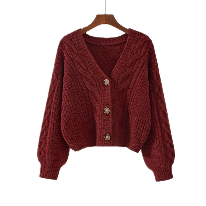 Damen Strickjacke mit ausgefallenem Zopfmuster und tiefem V-Ausschnitt ModeGeist