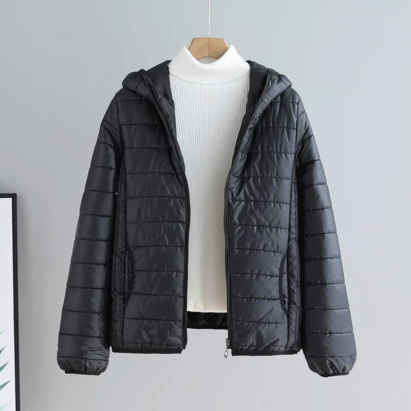 Damen gesteppte Übergangsjacke mit praktischen Taschen und Kapuze ModeGeist