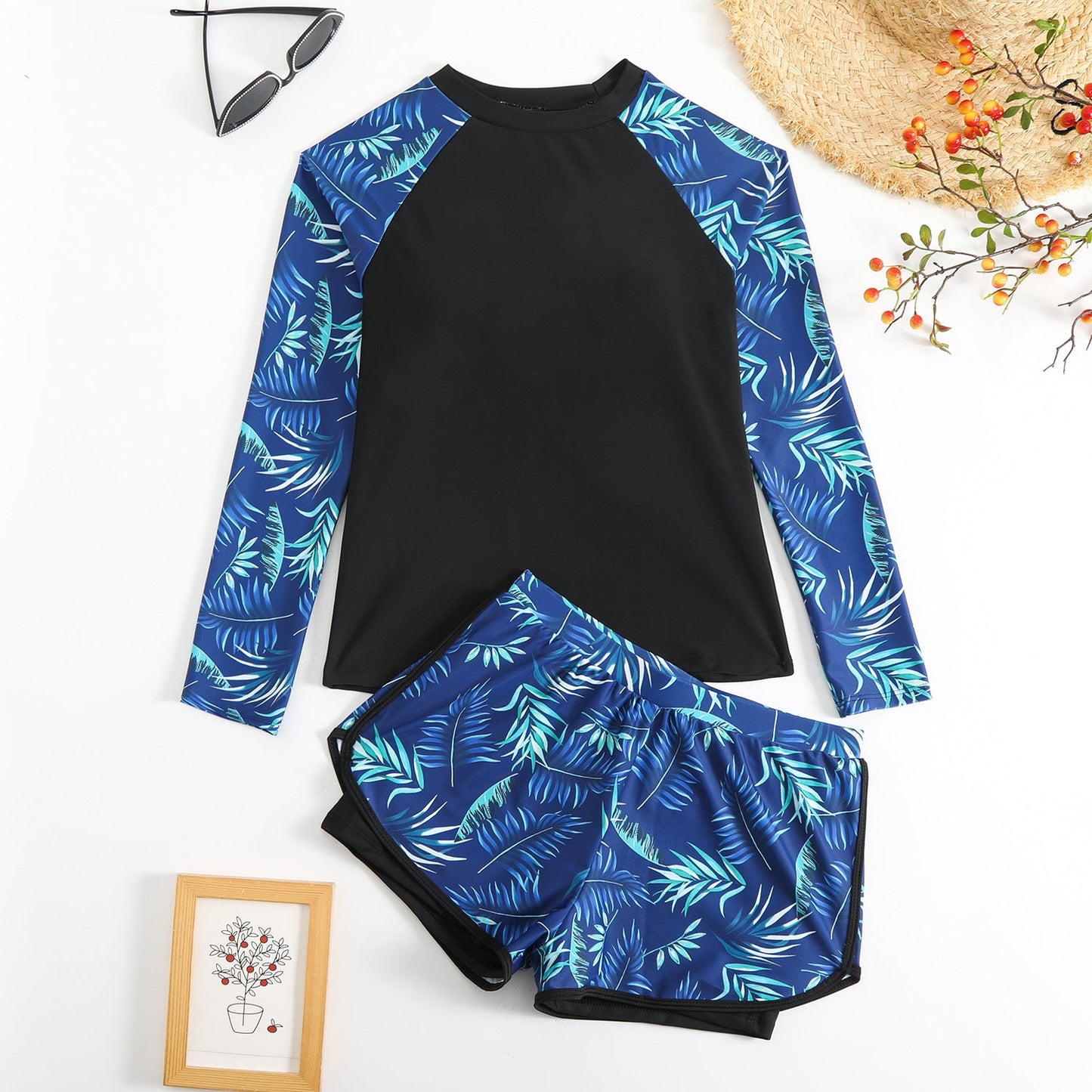 Modischer UV-Schutz Badeanzug für Damen mit langen Ärmeln und Blätter-Print von MODEGEIST